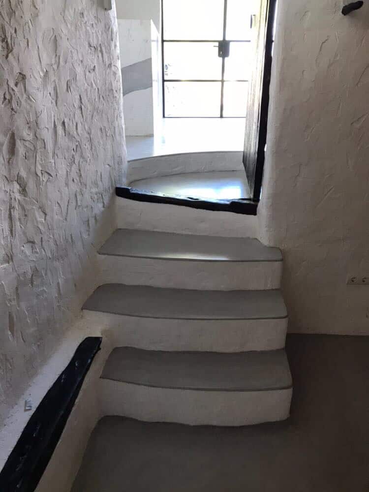 Rustic polished concrete stairwell