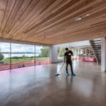 Contractor polishing concrete floor.