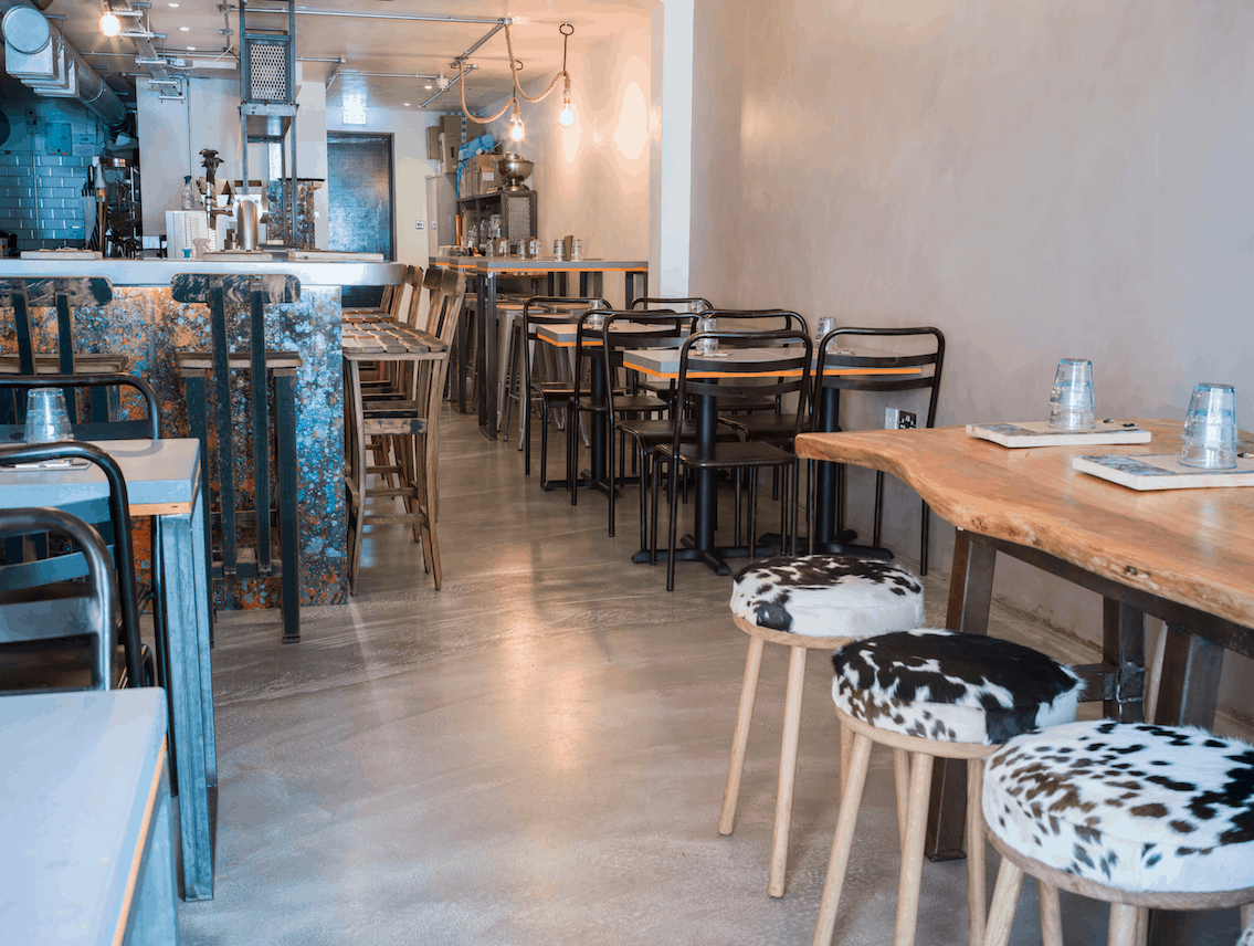 Restaurant interior with polished concrete floor.