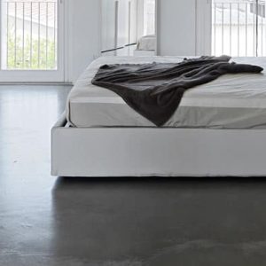 Polished concrete floor in bedroom