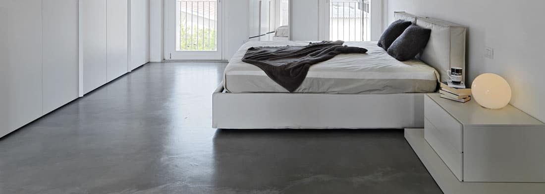 Polished concrete floor in bedroom
