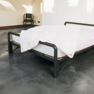 Bedroom floor with cement based overlay