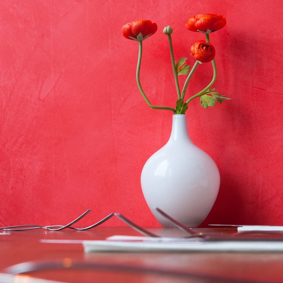 Bright red polished concrete wall