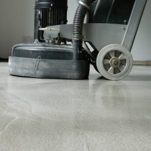 Polishing a polished concrete floor