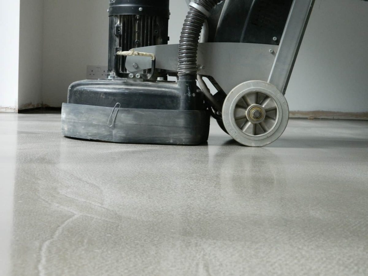 Polishing a polished concrete floor
