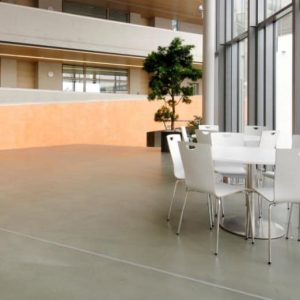 Waiting area with a cement based overlay concrete finish