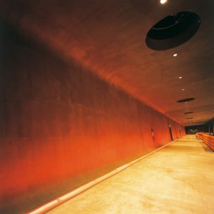Polished concrete corridor wall, floor and ceiling